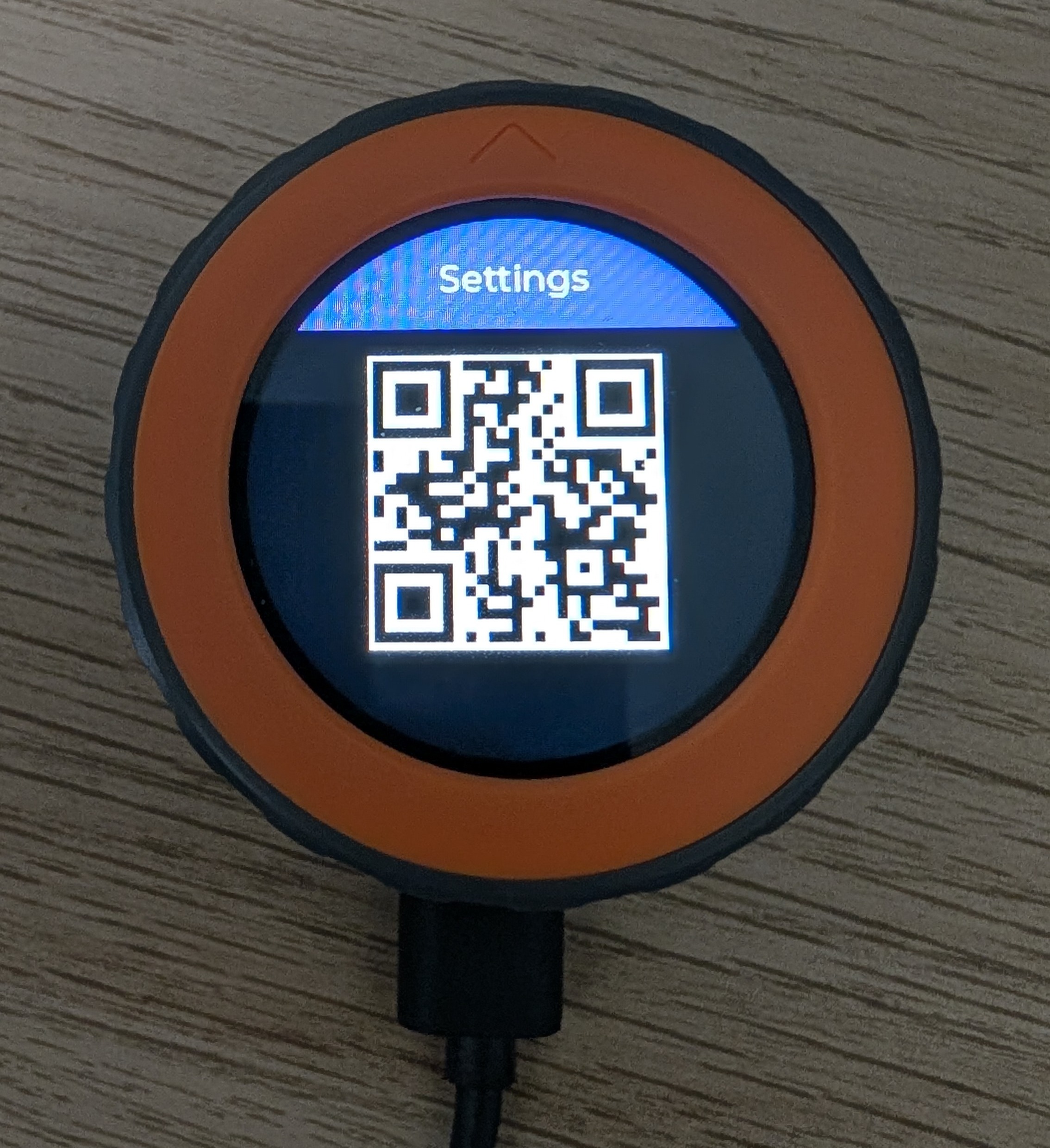 M5Stack Dial settings screen showing a QR code for the setup portal