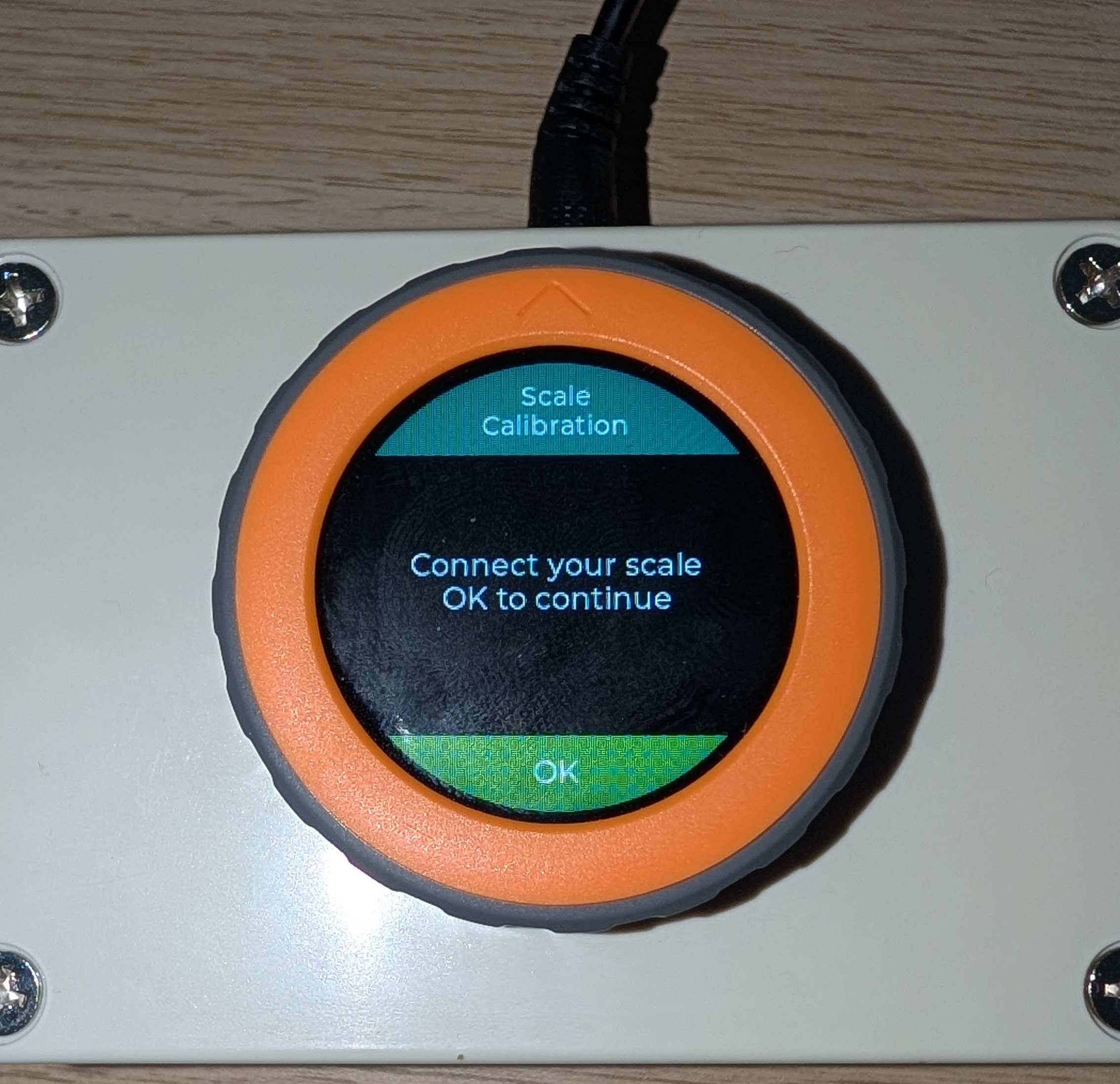 Dial calibration intro screen asking to connect the scale